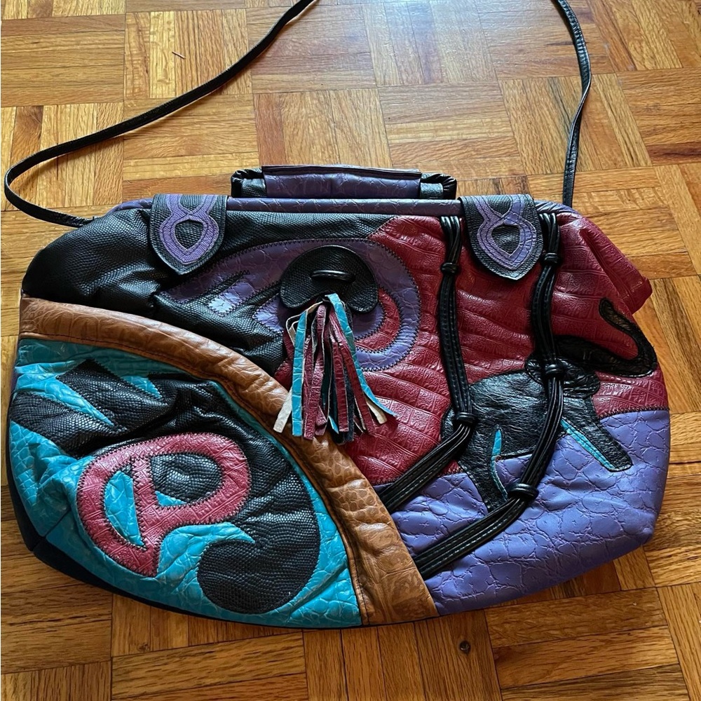Genuine leather multicolored oversized bag/clutch w/elephant and fringe.